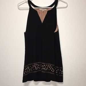 Beautiful, classy sleeveless blouse with cutouts